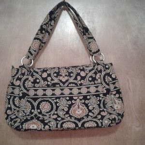 Vera Bradley purse.  Zippered pouch outside.